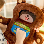DiDi is a modern teddy bear that will help little ones learn to read