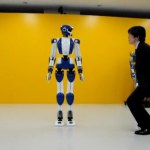 HRP-4 robot strutting the stage