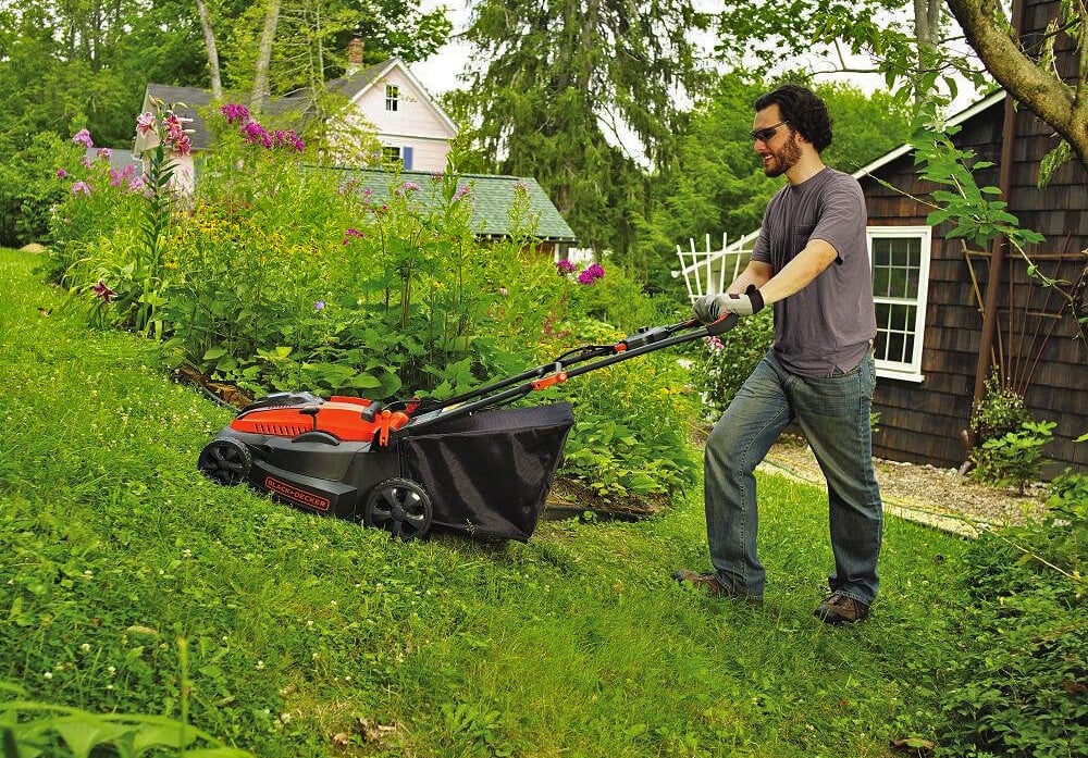 Black+Decker 16-Inch 40-Volt Cordless Lawn Mower on hill